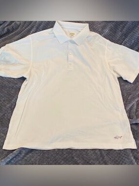 NWOT Men’s white Greg Norman SzL quick dry material men’s polo style golf shirt